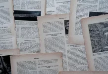Amende du tribunal correctionnel : recours, délais et démarches à suivre Personne anonyme examinant des documents judiciaires et un reçu sur une table